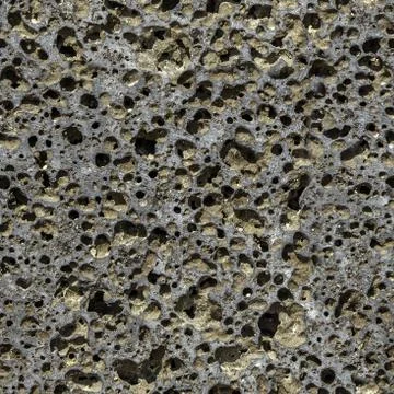 Seamless pattern texture of orange stone pumice with holes is in the photo Stock Photos