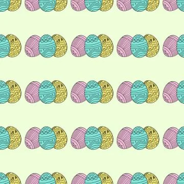 Seamless pattern of three easter eggs on a light green background. 스톡 일러스트