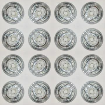 The seamless pattern of the tile is a square kaleidoscope in chocolate tones. Stock Photos