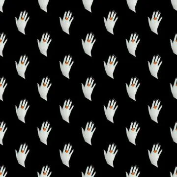 Seamless pattern. Top view of a white hand with black nails and a pumpkin rin Stock Photos