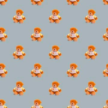 Seamless pattern with toy brown bears on a gray background. Foto stock