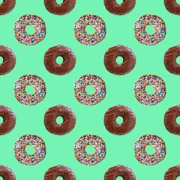 Seamless Pattern of Two Types of Chocolate Glazed Donuts on Mint Green Backdrop Stock Photos