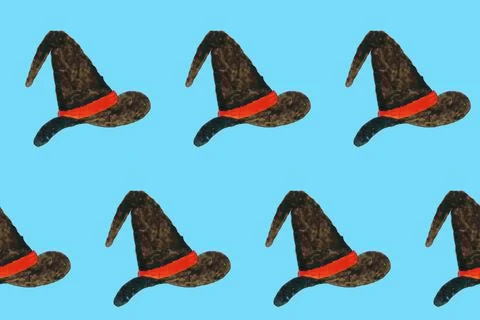 Seamless pattern with watercolor witch hat on blue board. Design element for  Stock Illustration