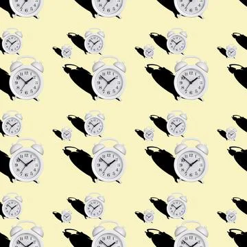 Seamless pattern of a white alarm clock with a shadow on yellow bed backgroun Stock Photos