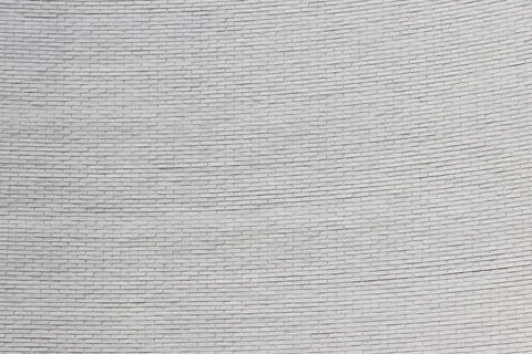 Seamless pattern of a white brick wall texture for background Stock Photos