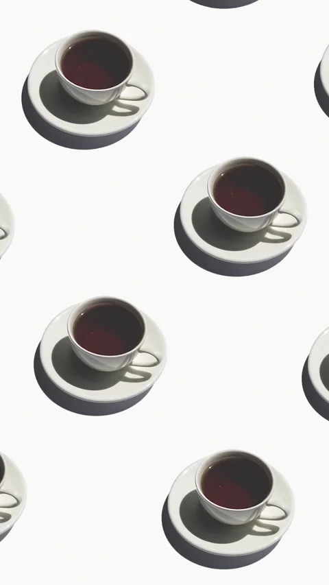 Seamless pattern of white cups with tea with strong shadows on a white Stock Footage 324584721