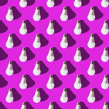 Seamless pattern. white lightbulbs is down on violet background. geometric ar Stock Photos