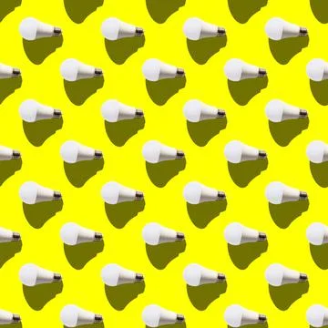 Seamless pattern. white lightbulbs is left on yellow background. geometric ar Stock Photos