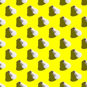 Seamless pattern. white lightbulbs is right down on yellow background. geomet Stock Photos