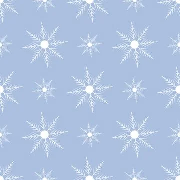 A seamless pattern of white snowflakes Vector. Stock Illustration