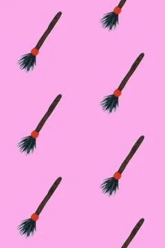Seamless pattern with witch's broom. Halloween illustration. Brown and orange Stock Illustration