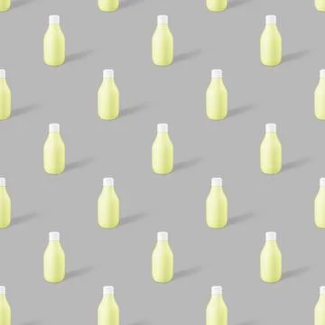 Seamless pattern of yellow biodegradable plastic cosmetic bottle mockup 스톡 사진