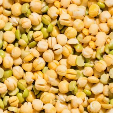 Seamless pattern with yellow green peas. Stock Photos