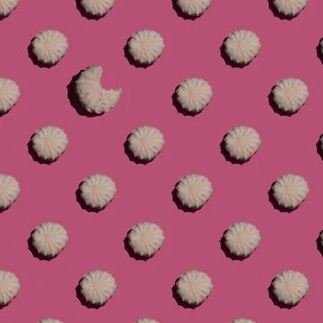 Seamless pattern with zephyr, marshmallows on a pink background as a creative Stock Photos