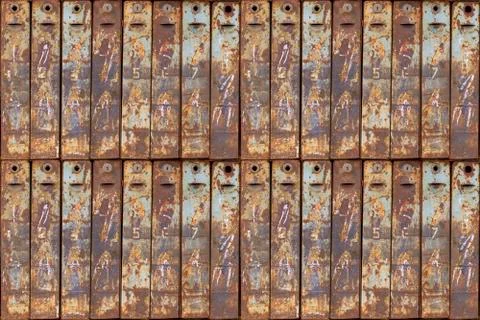Seamless photo texture of mailbox stack with rust Stock Photos