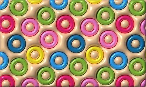 Seamless repeating pattern of glossy, multi-colored rings on a textured bei.. Stock Photos