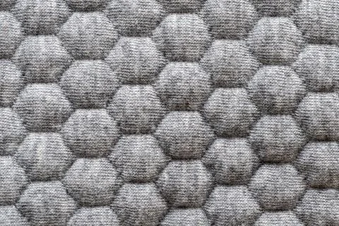 Seamless repetitive hexagonal pattern on soft fabric textile material Stock Photos