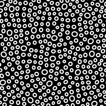 Seamless rings pattern. Doodle Small white dots Stock Illustration