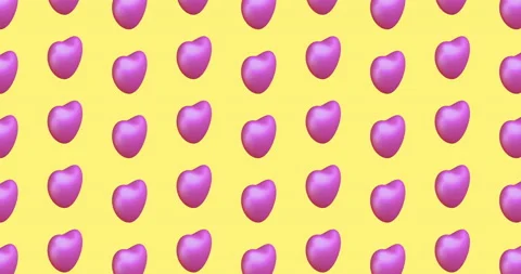 Seamless rotate animation pattern with small pink hearts on yellow background Stock Footage 169961801
