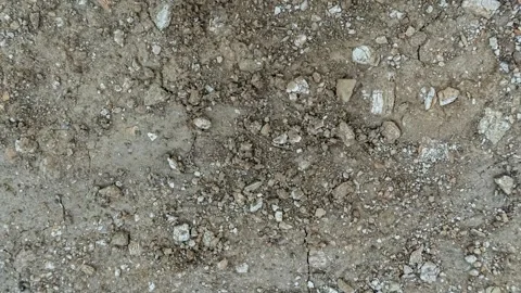 Seamless rotating loop of dry cracked earth ground texture with rough soil,.. Stock Footage 343516296