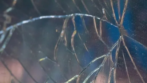 Seamless rotating loop of shattered glass texture with sharp cracks, damage.. Stock-Footage 343517132