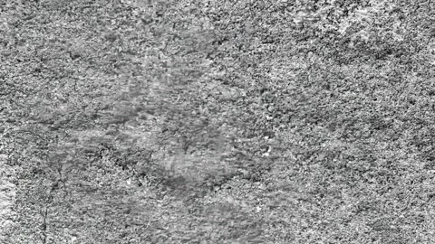Seamless rotating loop of textured grey concrete ground surface, featuring .. Stock Footage 343516910