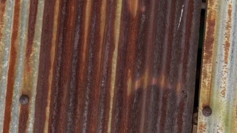 Seamless rotating loop of weathered rusty corrugated metal sheet texture, f.. Stock Footage 343516725