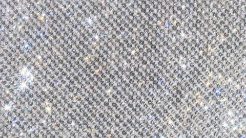 Seamless Rotating Silver Sparkling Crystals. Stock Footage 330660198