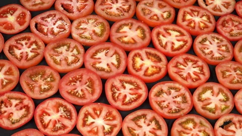Seamless Rotation of Fresh Red Tomato Slices Pattern Stock-Footage 342774493