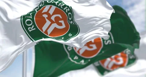 Seamless slow motion of three flags with the Roland-Garros logo waving Stock Footage 187300079