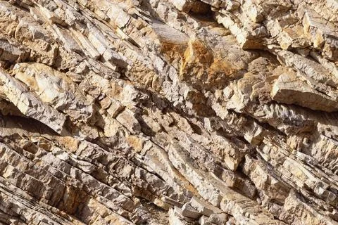 Seamless stone background, texture of sheer cliff Stock Photos
