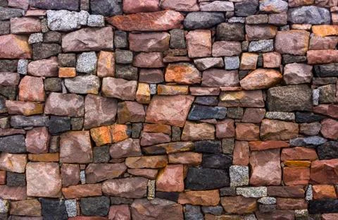 Seamless stone masonry using rectangular stones, red and gray shades Foto stock
