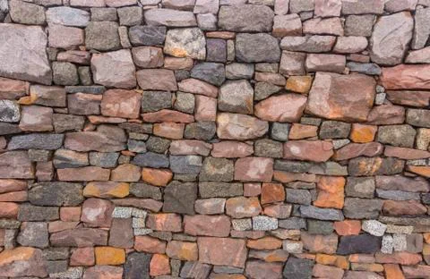 Seamless stone masonry using rectangular stones, red and gray shades Stock Photos