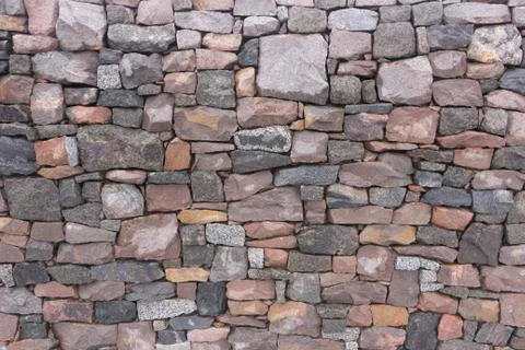 Seamless stone masonry using rectangular stones, red and gray shades Foto stock