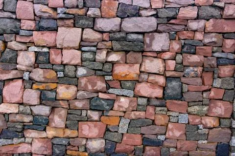 Seamless stone masonry using rectangular stones, red and gray shades Stock Photos