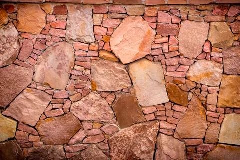 Seamless stone masonry using rectangular stones, red and gray shades Foto stock
