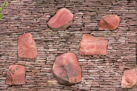 Seamless stone masonry using rectangular stones, red and gray shades Stock Photos
