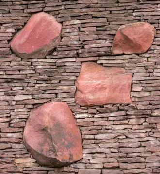 Seamless stone masonry using rectangular stones, red and gray shades Stock Photos