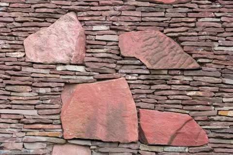 Seamless stone masonry using rectangular stones, red and gray shades Stock Photos