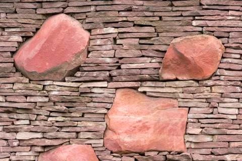 Seamless stone masonry using rectangular stones, red and gray shades Foto stock