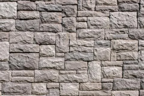 Seamless stone wall texture background. Stock Photos