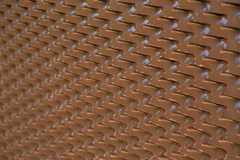 Seamless structured plastic surface in brown with a gradient from sharp foreg Stock Photos