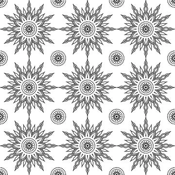 Seamless  sun pattern on a white background, featuring intricate rays and d.. Stock Illustration