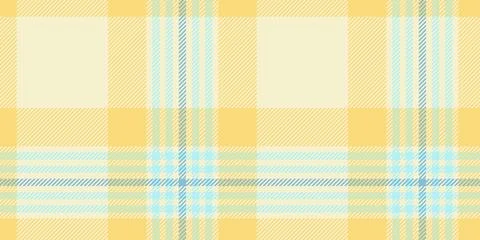 A seamless tartan plaid pattern featuring a cheerful blend of yellow and li.. Stock Illustration