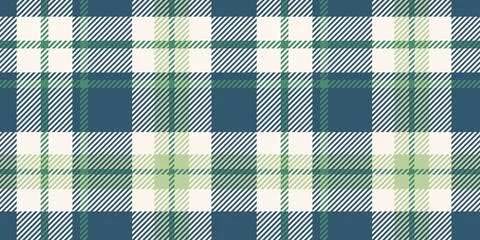 A seamless tartan plaid pattern in navy blue, green, and white tones. Perfe.. Stock Illustration