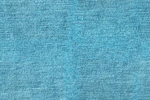 Seamless texture background of light blue denim fabric Stock Photos