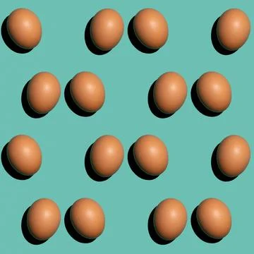 Seamless texture background pattern from eggs on a colored background. Minima 스톡 사진