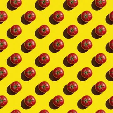Seamless texture background pattern from fresh red tomatoes on a colored back Stock-Fotos
