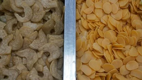 Seamless texture background from raw crackers Stock Photos