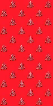 Seamless texture with Christmas trees made of wrenches decorated with balls on a 스톡 사진